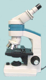 Figure 1.  Compound microscope - move cursor over the list of microscope parts and note the highlighted areas to identify various components. (Courtesy M. B. Riley)
